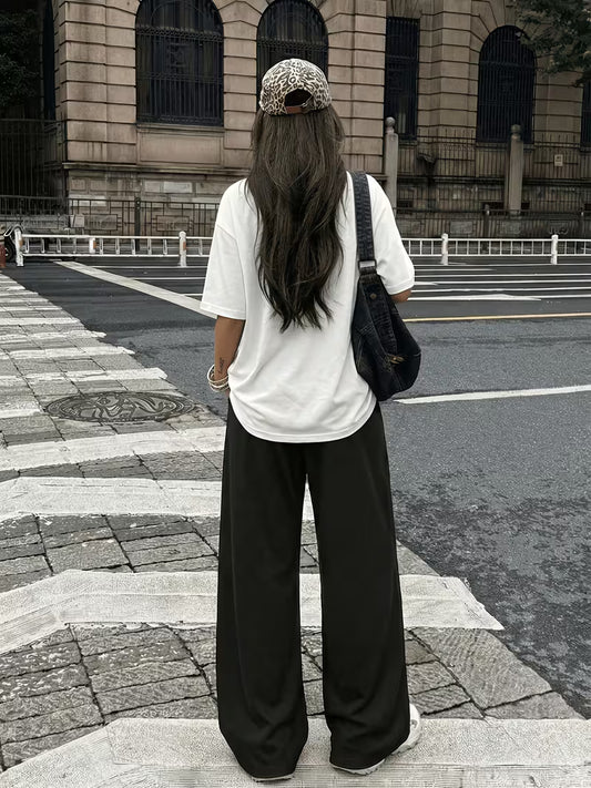 "NO RISK, NO STORY" Oversized Streetwear Set – White Drop-Shoulder Graphic Tee & Black Wide-Leg Trousers