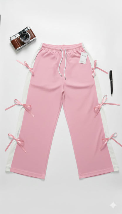 Chic Pink Wide-Leg Trousers with Side Ribbon Detail